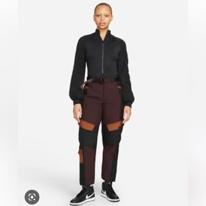 NWT Jordan pants. Synthetic fill. Makes it feel insulated and warm.